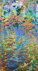 Multicolored Lava Swirls Under Beautiful Colored Foil