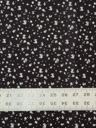 Tiny White Cute Flowers on Black Cotton Spandex Fabric